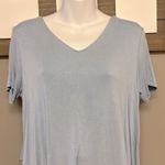Lisa Rinna Asymmetrical Light Blue Shirt Horizontal and Lace Accents Photo 2