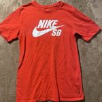 Nike  SB Tshirt Women's Size Small Orange Logo Spellout Short Sleeve Top Photo 0