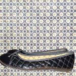 Christopher & Banks  black patten leather quilted look design with tie on front Photo 3