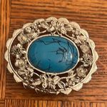 Metal belt buckle with a man Photo 0