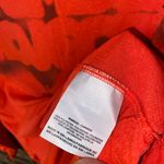 Nike  Orange November Project Spray Paint T-Shirt Women's Size Small Photo 4