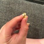 Yellow gold Huggies with rhinestones and a white star Photo 1