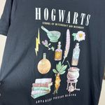 Harry Potter NWT Womens Hogwarts Wizarding World T Shirt Medium  Black Potion Photo 1
