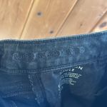 American Eagle super high-rise black jeggings distressed knee skinny jeans Photo 8