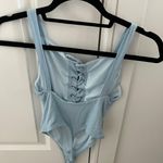 Privacy Please Revolve  Light Blue Ribbed Tie Up Bodysuit Photo 1
