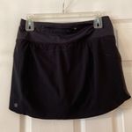 Athleta  Skorts size S excellent condition color black waist 28” flat length 14” Photo 1