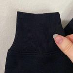 Good American  Peepin’ black grommet sweatshirt size M Photo 6