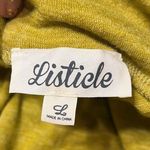 Listicle women’s long sleeve button back top in VGUC. Photo 5