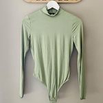 Urban Outfitters  Long Sleeve Bodysuit Green Sz Small NWT Photo 0