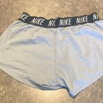 Nike Women's Athletic DriFit Shorts in Light Gray Photo 1