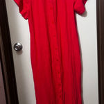 Lilla P Red Button Photo 0