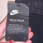 Nike NWT Tech Pack Black Capri Sweats Zip Up Legs Pockets Sweatpants Photo 8