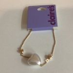 Icing White & Gold With Chain Style Strap Wallet, Heart Bracelet & Star Ring. Photo 3