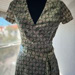 ZARA The dress in the image is a wrap style, with a geometric print of green circles Photo 3