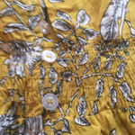 Flower print dress with smocking at the waist. This XL size dress is 100% rayon. Gold Photo 3