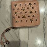 Jimmy Choo Star Studded Canvas Zippy Bifold Wallet
Pink Photo 6