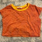 Free People  Beach Orange Floral Ribbed Baby Cropped Tee Photo 0