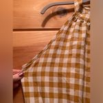Gingham mock neck halter swing dress. Size large. Gold Photo 1