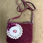 Elegant Burgundy Crossbody Bag with Floral Accent Purple Photo 0