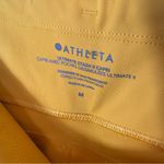 Athleta  Ultimate‎ Stash II Capri Leggings Yellow Size Medium Photo 7