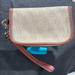 Dooney & Bourke  Cream and Brown Clutch with Vintage-Inspired Design Photo 1