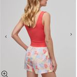 Travis Mathew  DAWN GLOW TECH WOVEN ROMPER Size S Photo 1