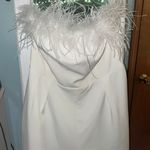 Altar'd State white jumpsuit with feathers Photo 1
