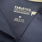 Fabletics  Navy Blue scrubs Women's Top size medium Photo 1