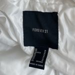 Forever 21  white cropped puffer jacket medium Photo 4
