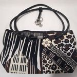 Brighton Black and White Animal Print Handbag with Decorative Charms Photo 0