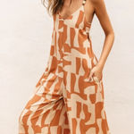 Dress Forum Boutique print orange and Cream Jumpsuit Photo 0