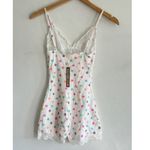 SKIMS Fits Everybody Lace Triangle Onesie in Marble Candy Heart Print, Size Smal Photo 8