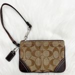 Coach brown logo print wristlet Photo 0