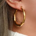 Hoop earrings gold cutted surface Photo 0
