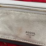Fossil | pebbled leather snap and zip wallet. Two-tone color. Gold hardware. Photo 10