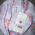 Altar'd State New As Revival White and purple floral leggings MSRP $59.95 Photo 3