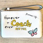 Coach NWT White and Yellow Clutch with Butterfly Art And Leather Strap Photo 0
