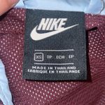 Nike  Women’s Sz XS Windrunner Colorblock Hooded Jacket  Light Blue Maroon Photo 2