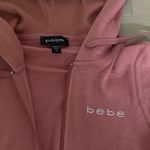 Bebe Y2K  logo rhinestone hoodie pink S never worn. Photo 1