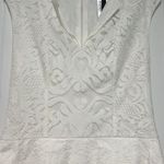 BCBGMAXAZRIA BCBG WHITE ISABEL CAP SLEEVE DRAPED-SIDE PEPLUM LACE DRESS NWT ($228) SZ 2. Photo 4