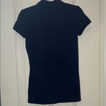 Lilly Pulitzer Navy Polo Shirt with Pink Palm Logo Photo 1