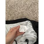 Nike dri fit athletic running black shorts women’s size large loose fit gym Photo 4