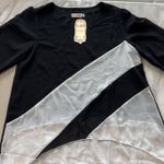 XinXinJia Black and White Asymmetrical Blouse, Size M, Long Sleeve Casual Top Size M Photo 0