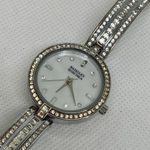 Badgley Mischka  women silver tone watch 28mm  rhinestones mop dial 6.5” running Photo 1