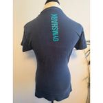 Gymshark  Women's Graphic T Shirt Navy Blue Turquoise Logo Size S flaw Photo 2