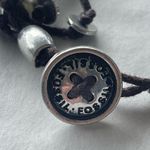 Fossil  multi cord bracelet with silver flowers and discs Photo 3