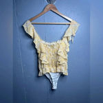 Lulus  Sweetest Frills Yellow Print Tie-Strap
Smocked Bodysuit Photo 4