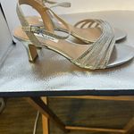 Nina of New York size 8 1/2. 3 inch heels, silver and silver sparkles.​​ Photo 1