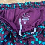 Nike Tempo Women’s Sz L Burgundy/Black/Teal Geo Pattern 3” Running Shorts Photo 2
