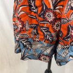 Angie orange and blue smocked boho floral romper with pockets size medium Photo 2
